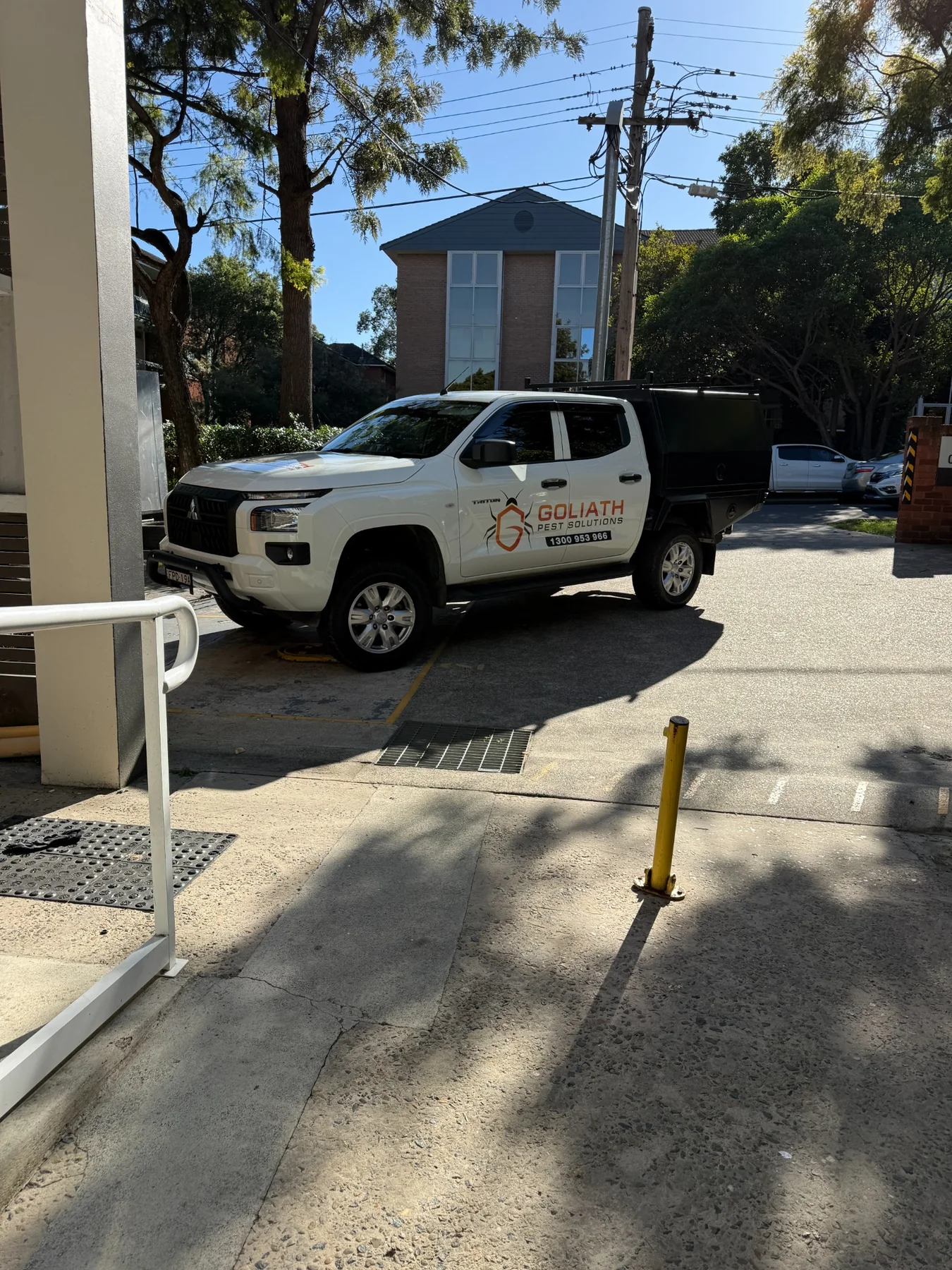Goliath Pest Solutions vehicle parked at a Sydney property
